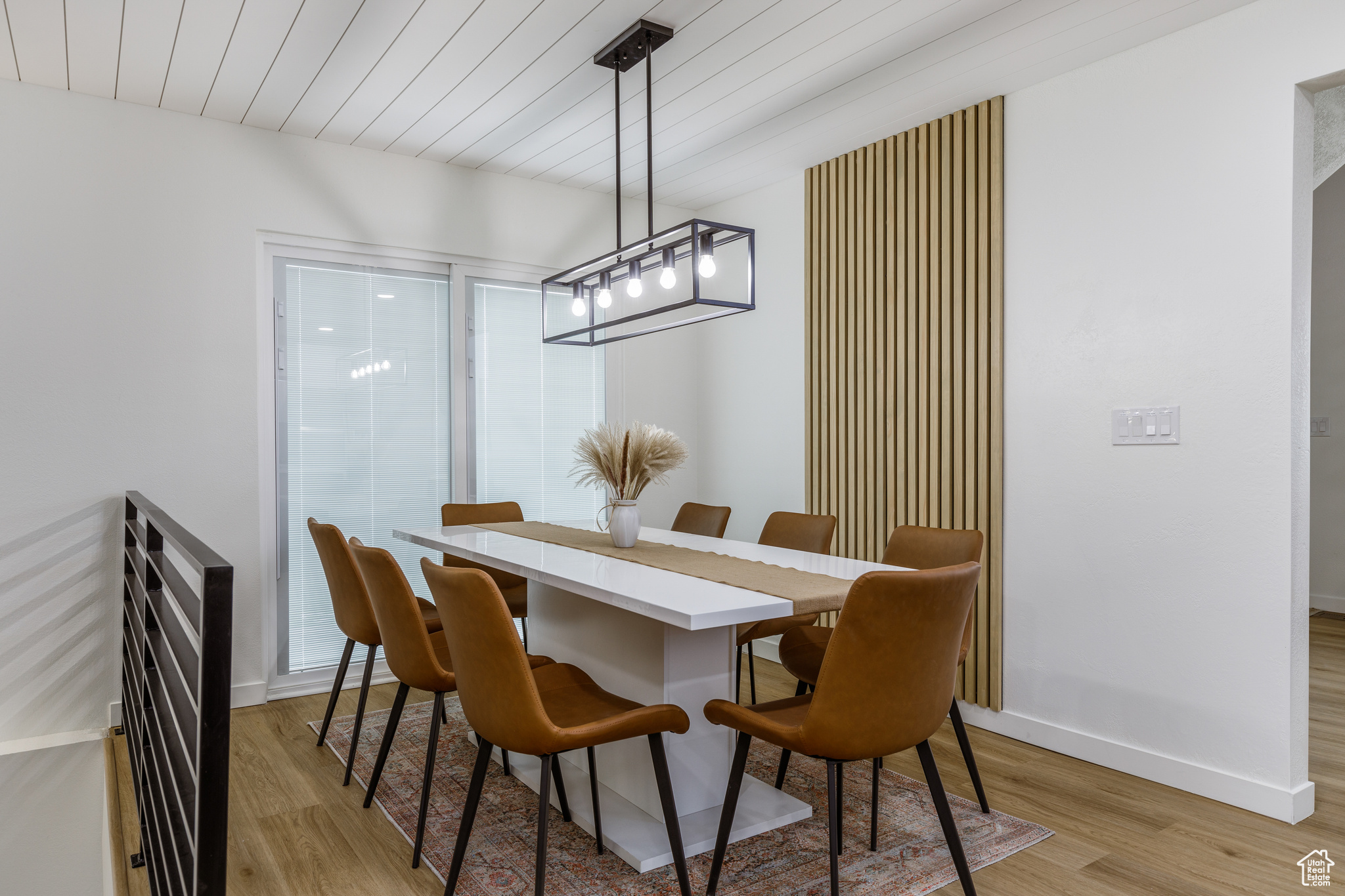 Dining area featuring wooden ceiling and light wood-type flooring