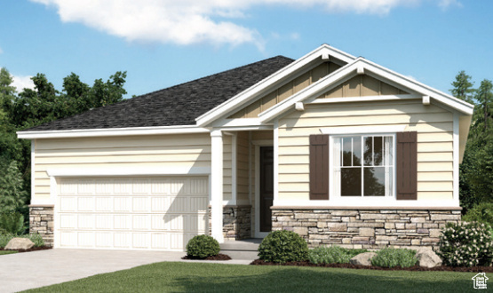 Craftsman-style home featuring a garage and a front yard