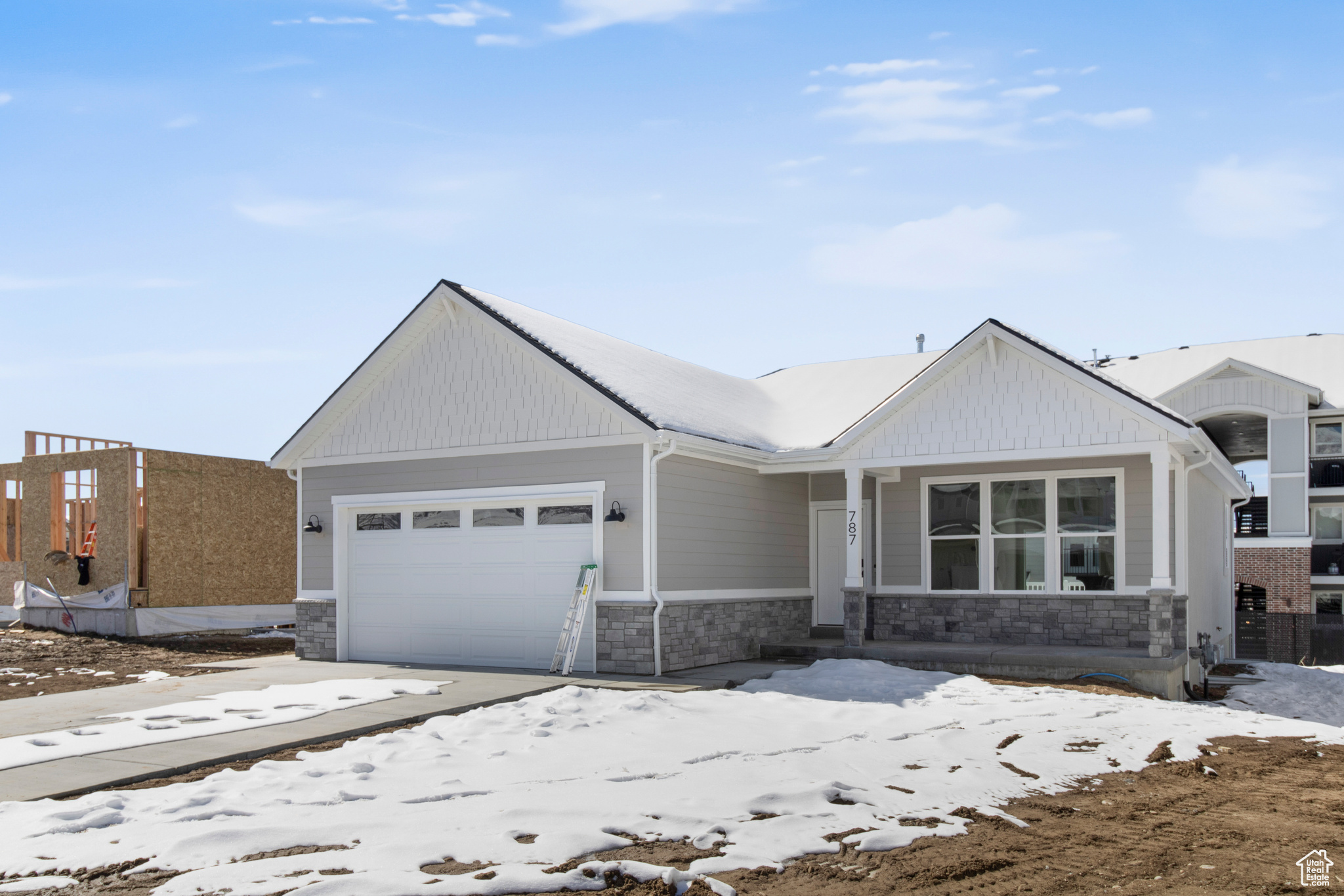 View of front of home with a two-garage