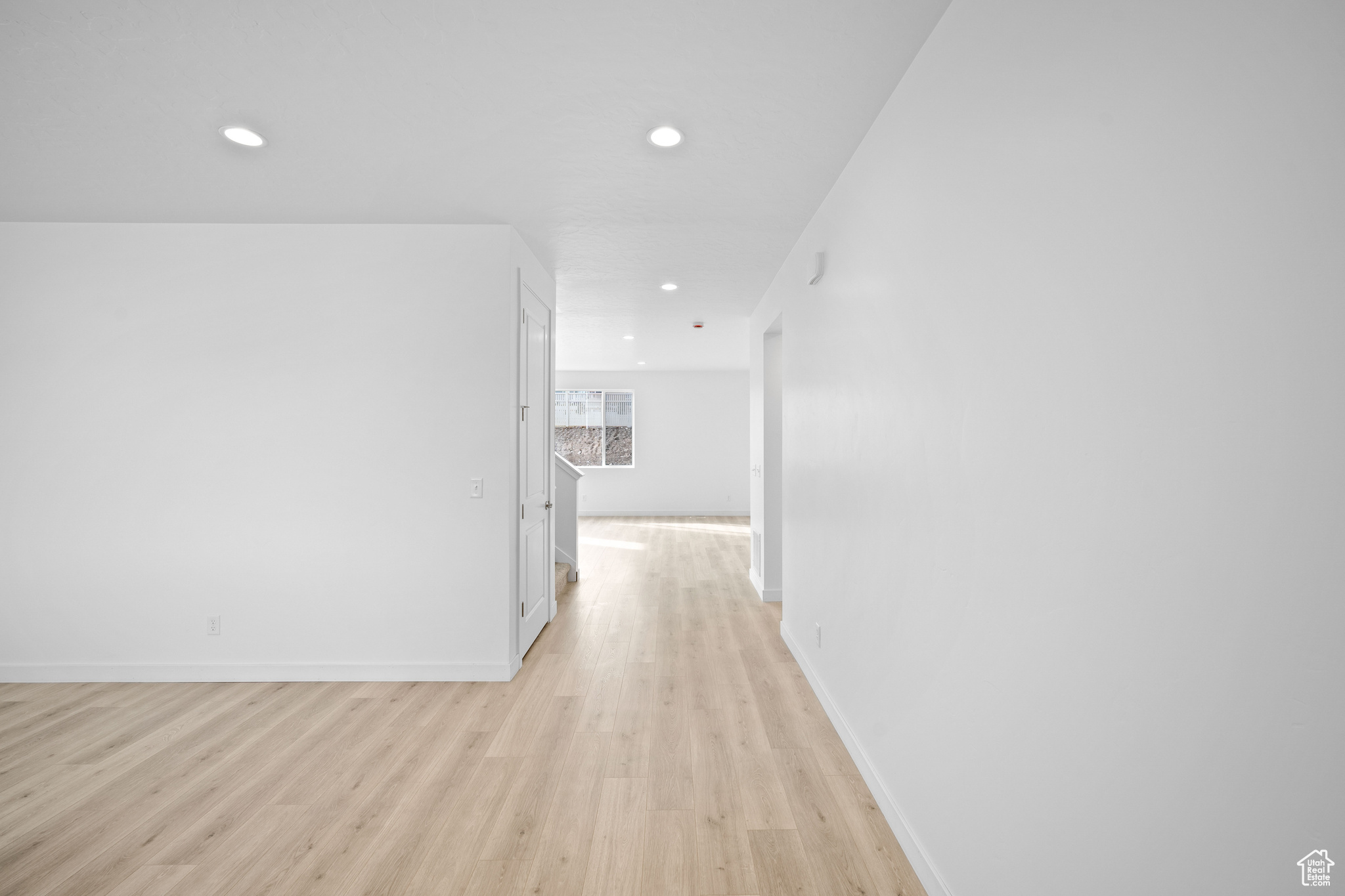 Hallway featuring light hardwood / wood-style floors