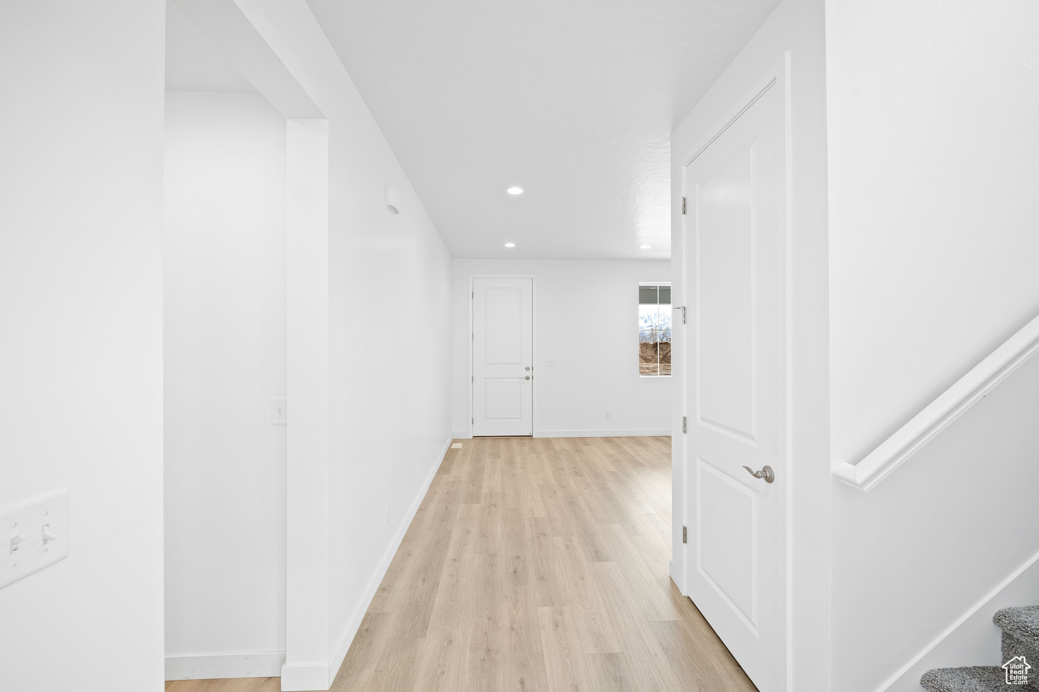 Hall featuring light hardwood / wood-style floors