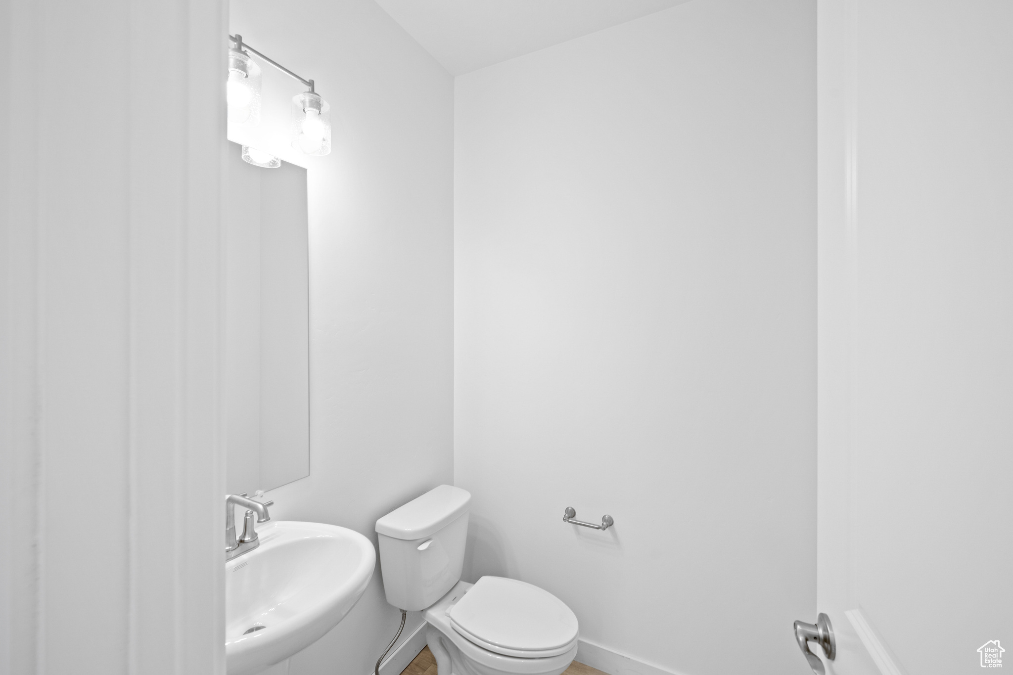 Bathroom featuring toilet and sink