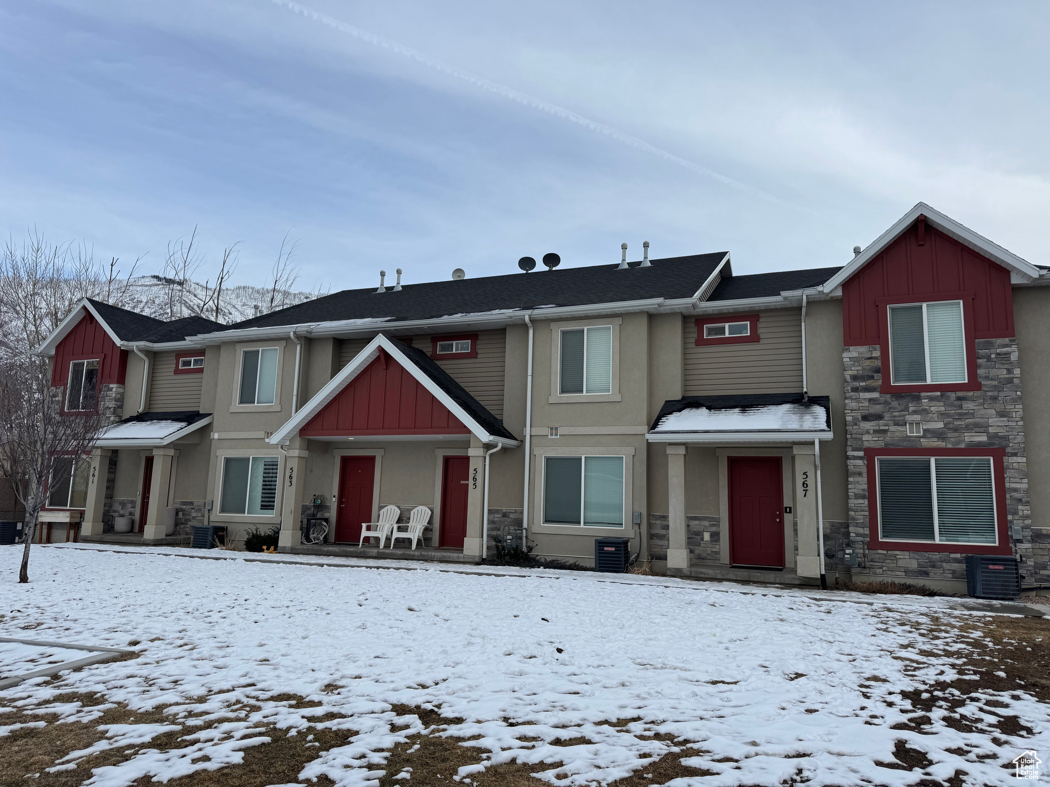 View of front of property with central AC