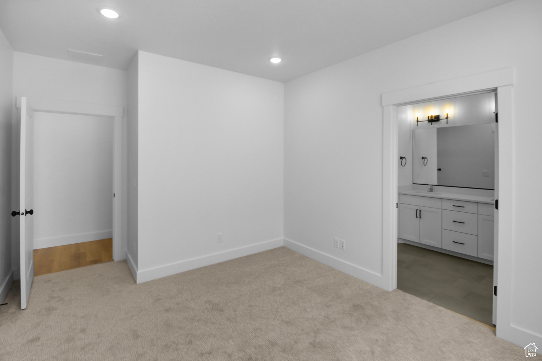 Master bedroom with bathroom and walk-in closet