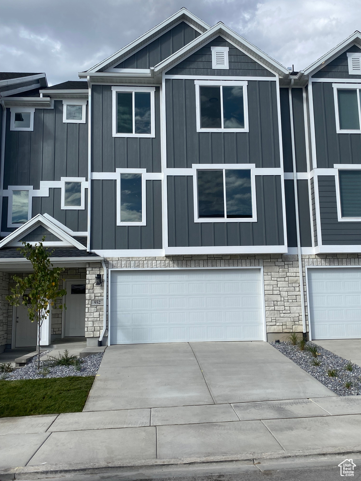 View of front of house with a garage. Color is Subject to change