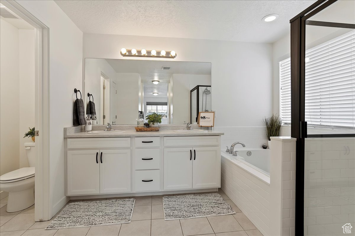 Full bathroom with 2 sink vanity.