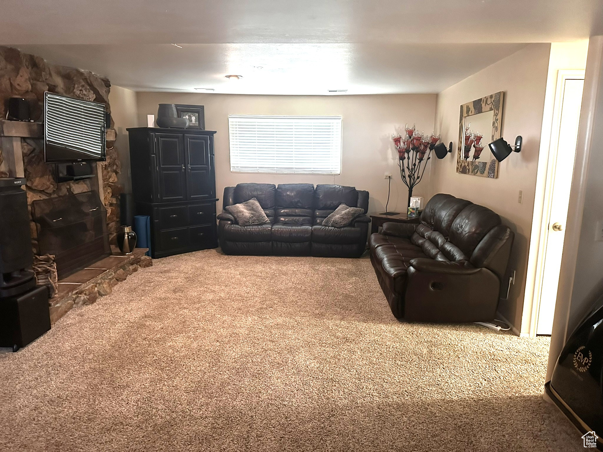 Living room featuring carpet floors