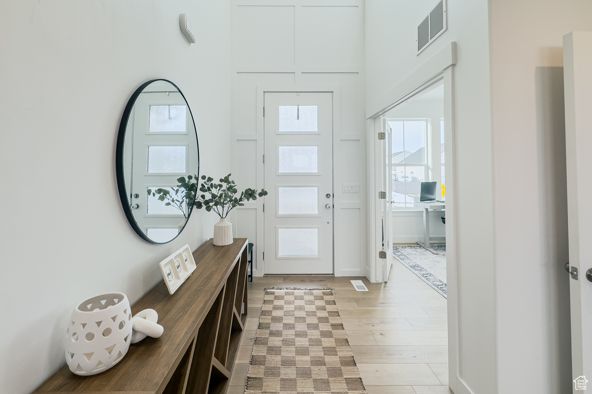 Entryway with light wood-type flooring