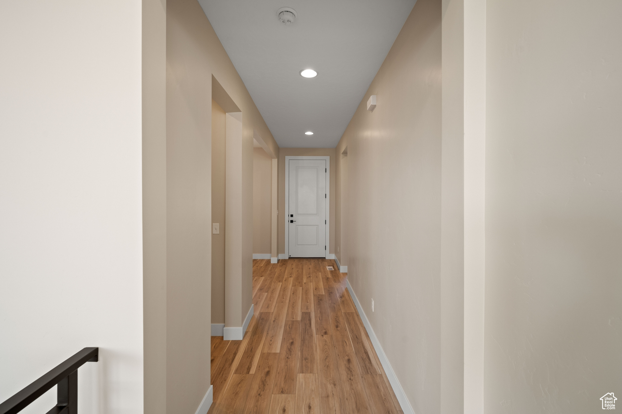 Hall with light wood-type flooring