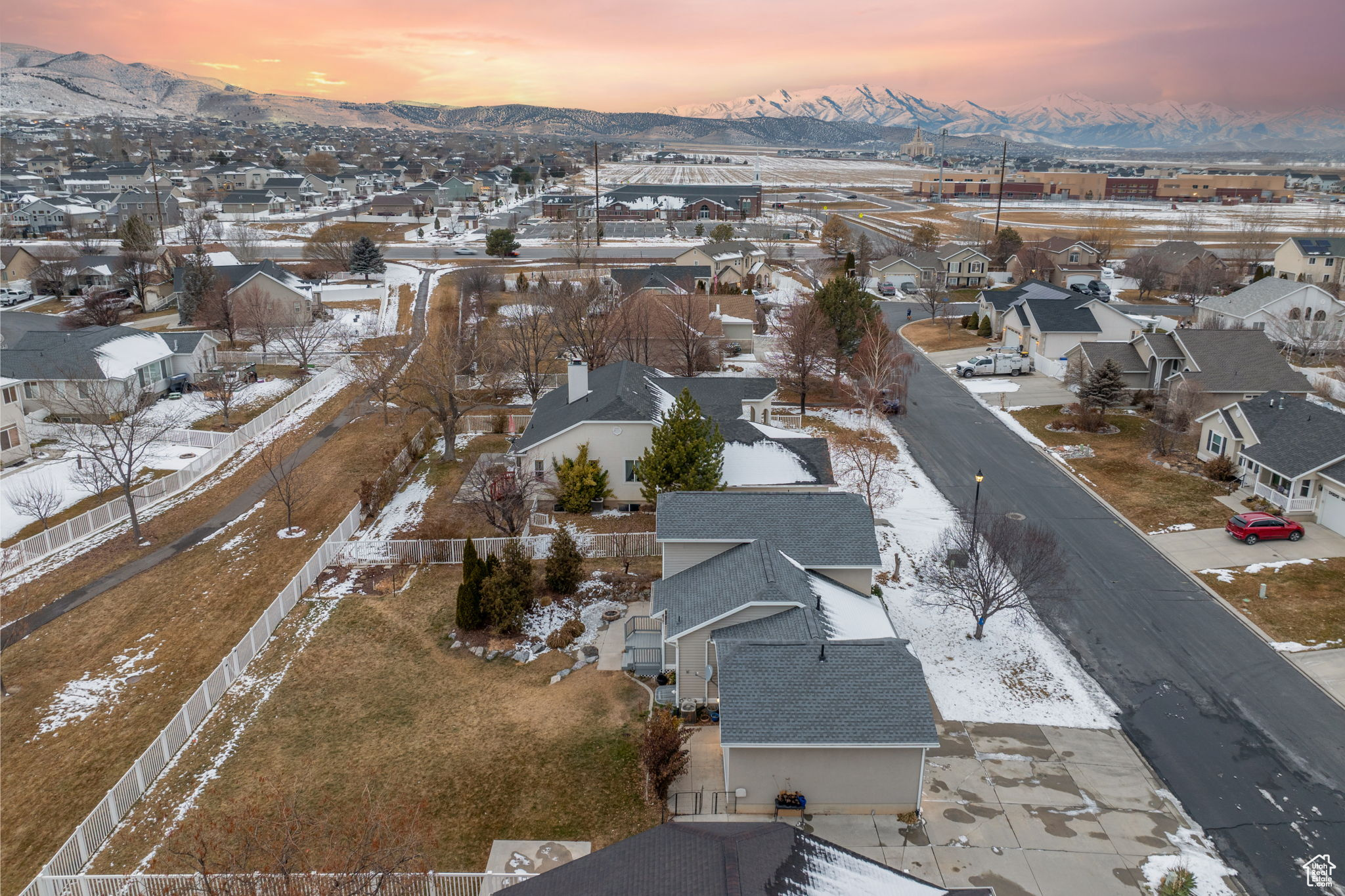 Aerial view at dusk featuring a mountain view