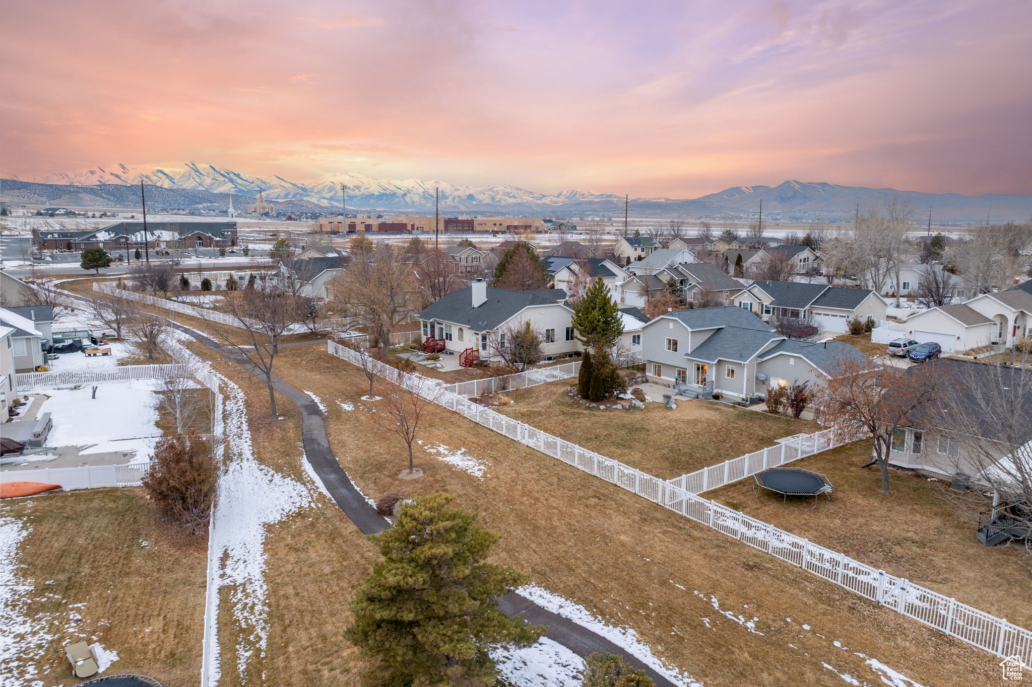 Aerial view at dusk featuring a mountain view