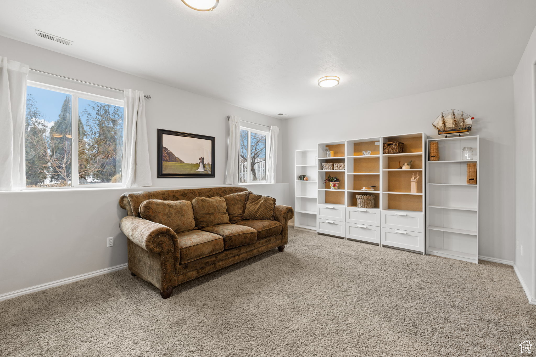 Living room with carpet floors