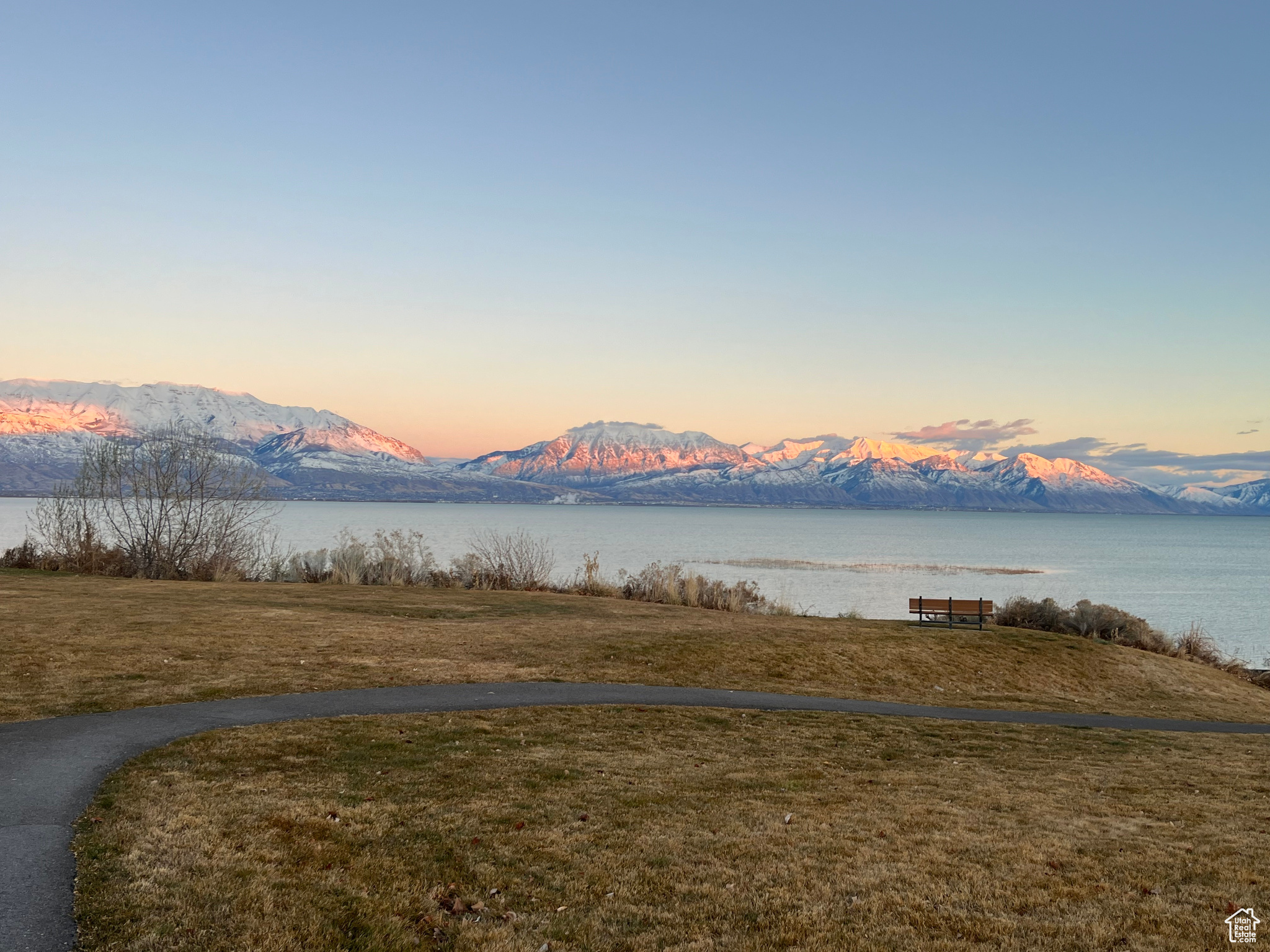 Property view of mountains featuring a water view