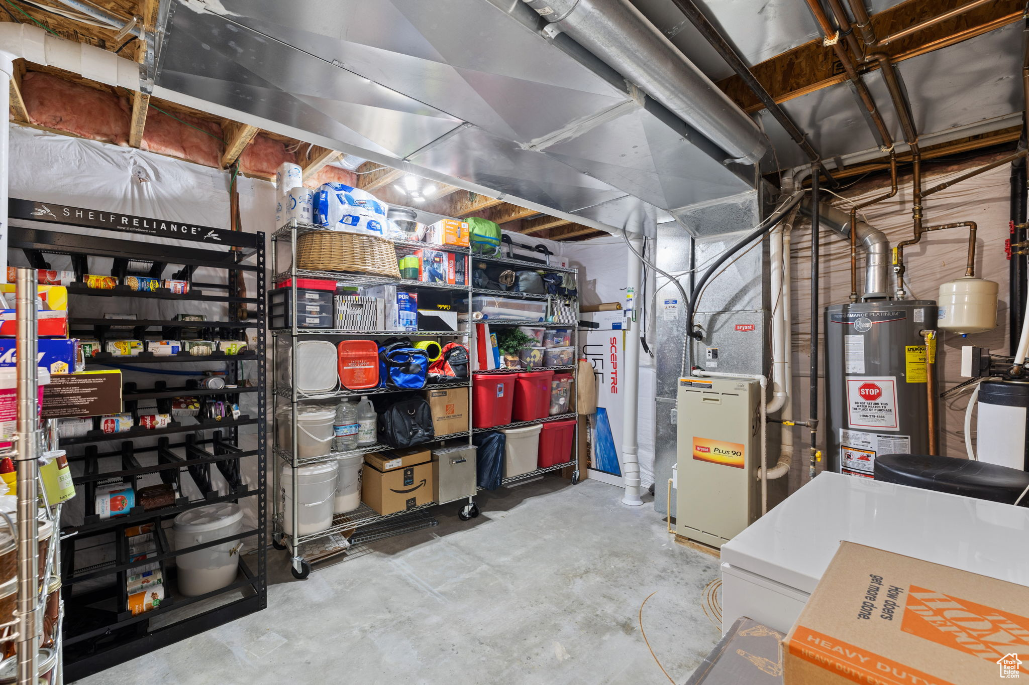 Basement with water heater and heating unit