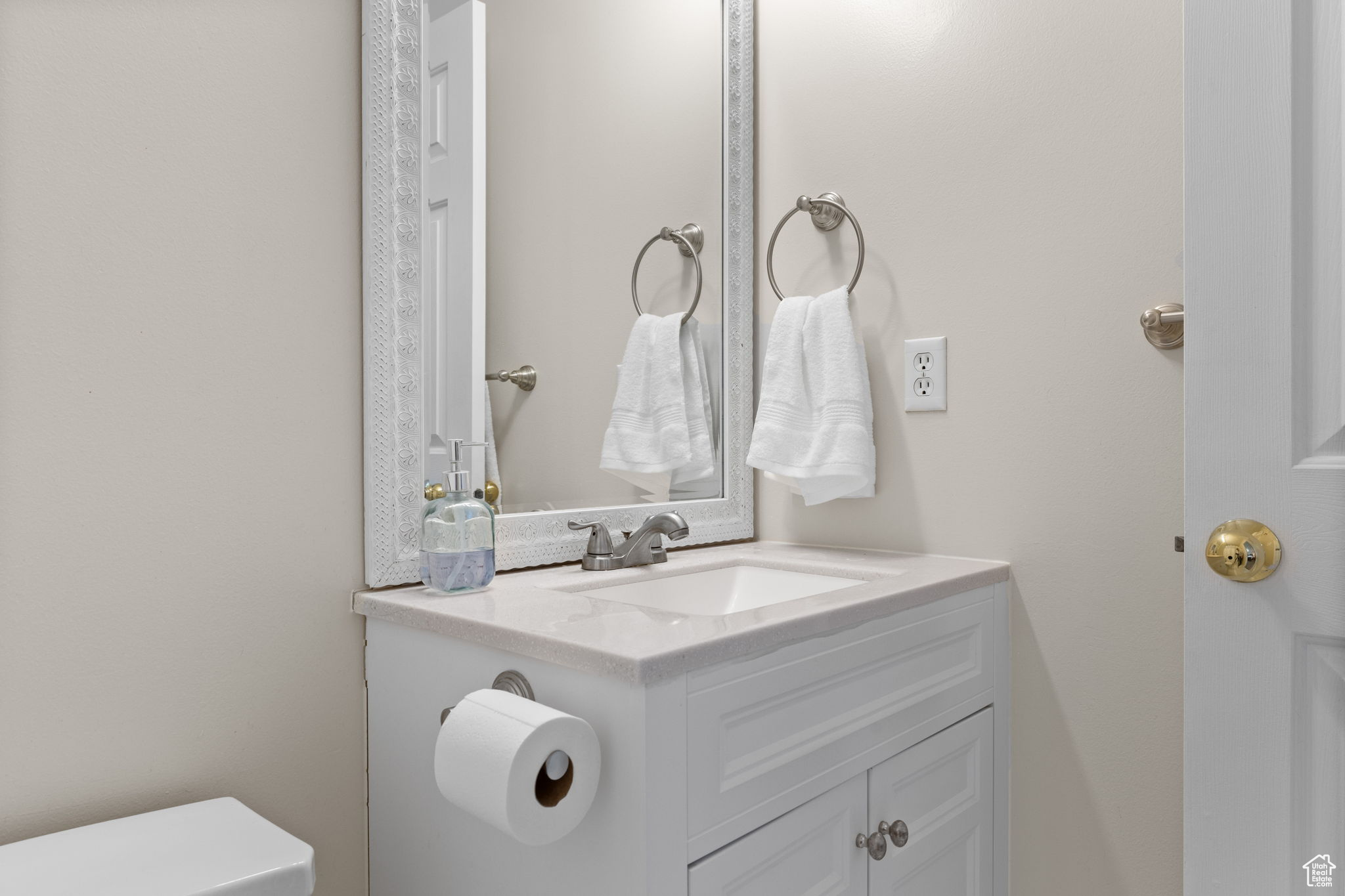 Bathroom with vanity and toilet