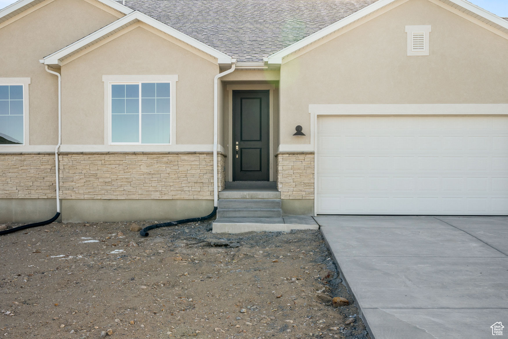 View of front facade with a garage