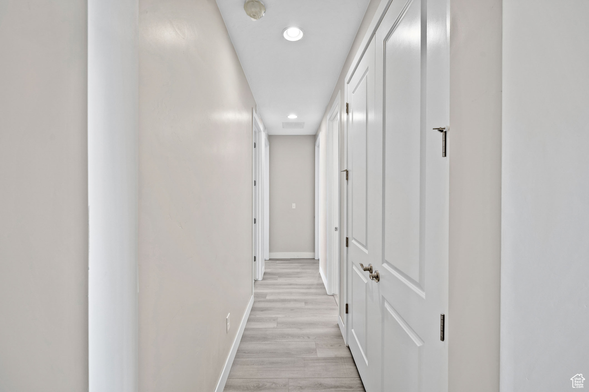 Hall featuring light hardwood / wood-style floors