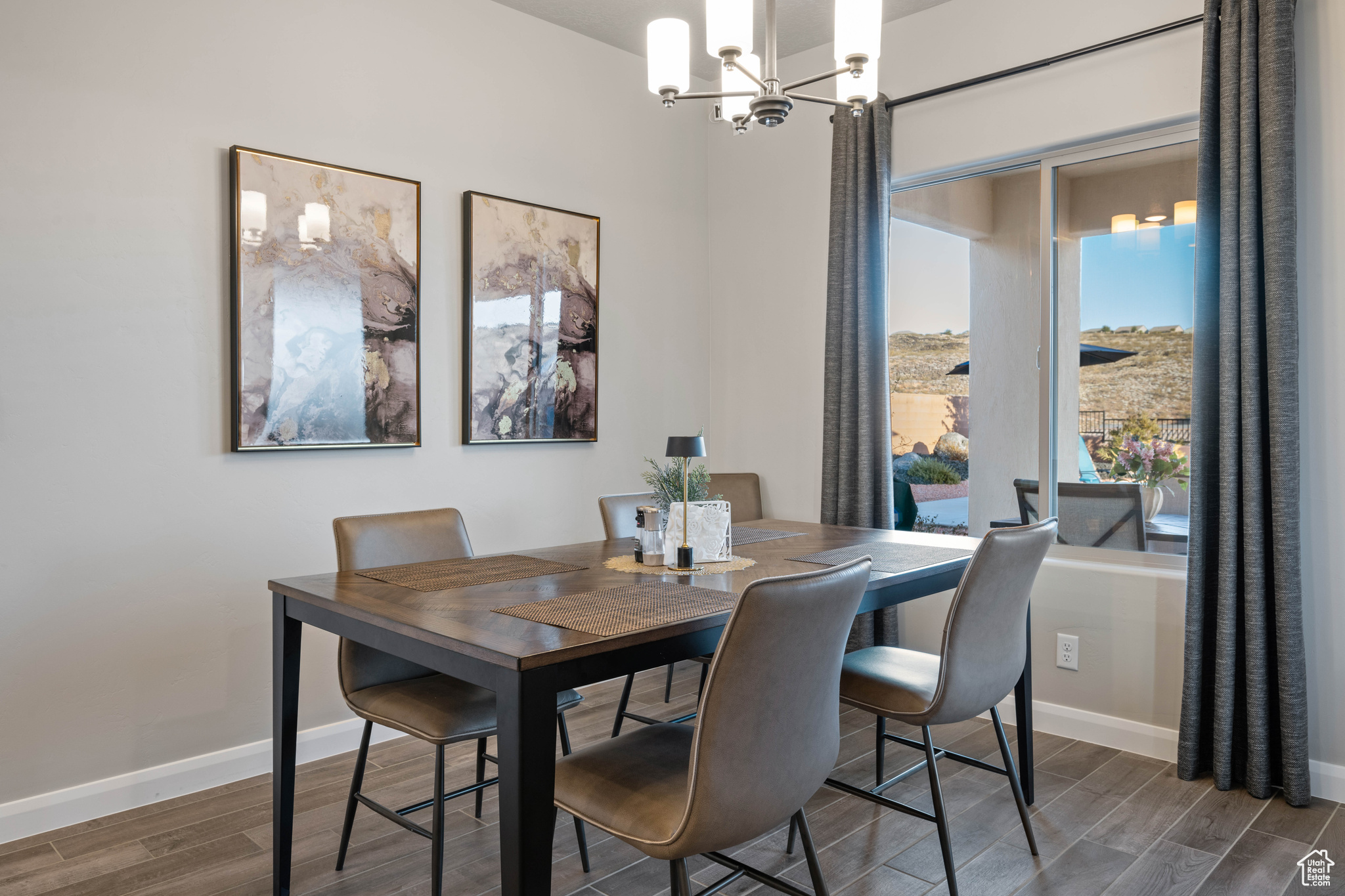 Dining space featuring a notable chandelier