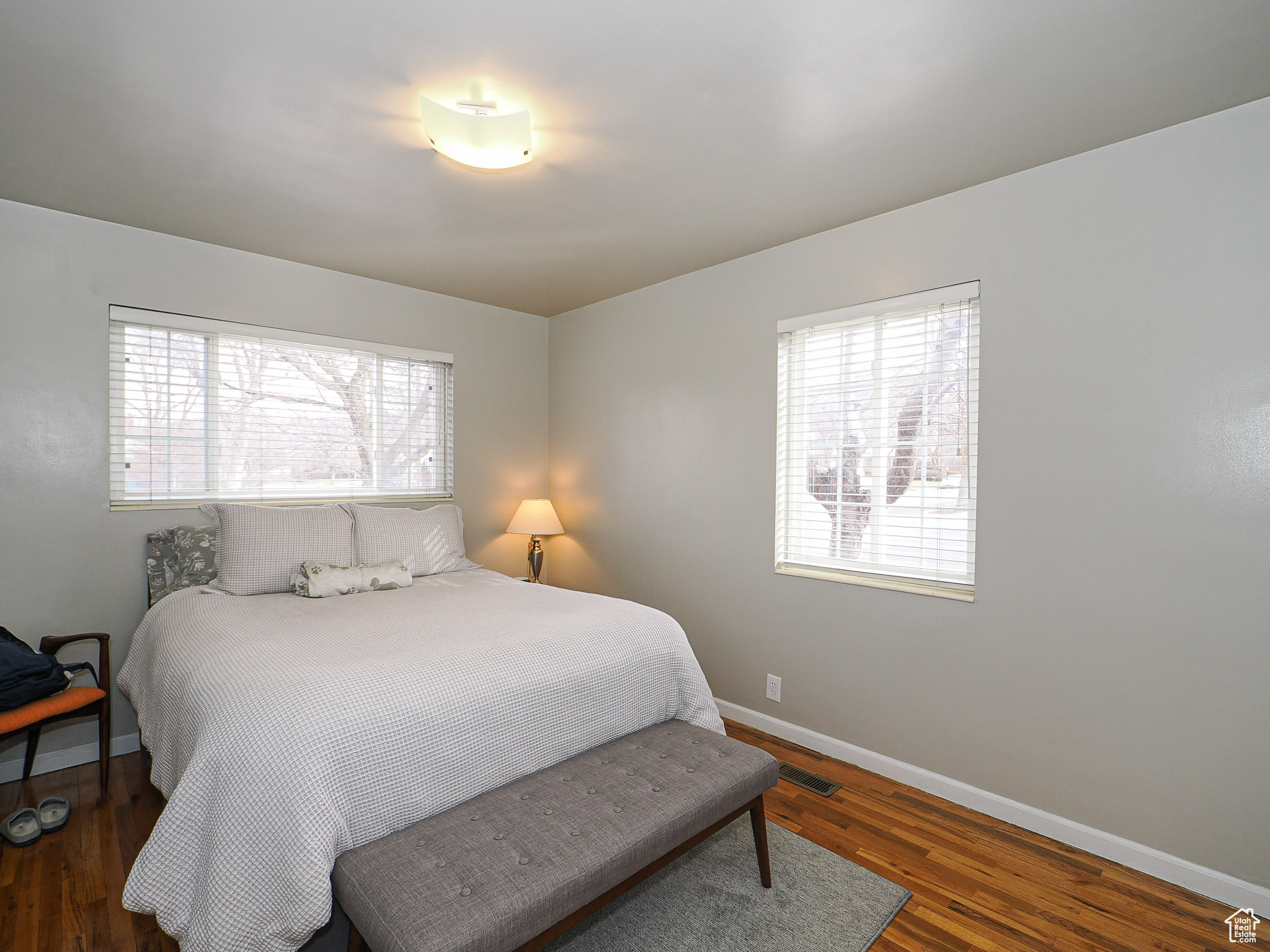 Bedroom featuring dark hardwood / wood-style floors