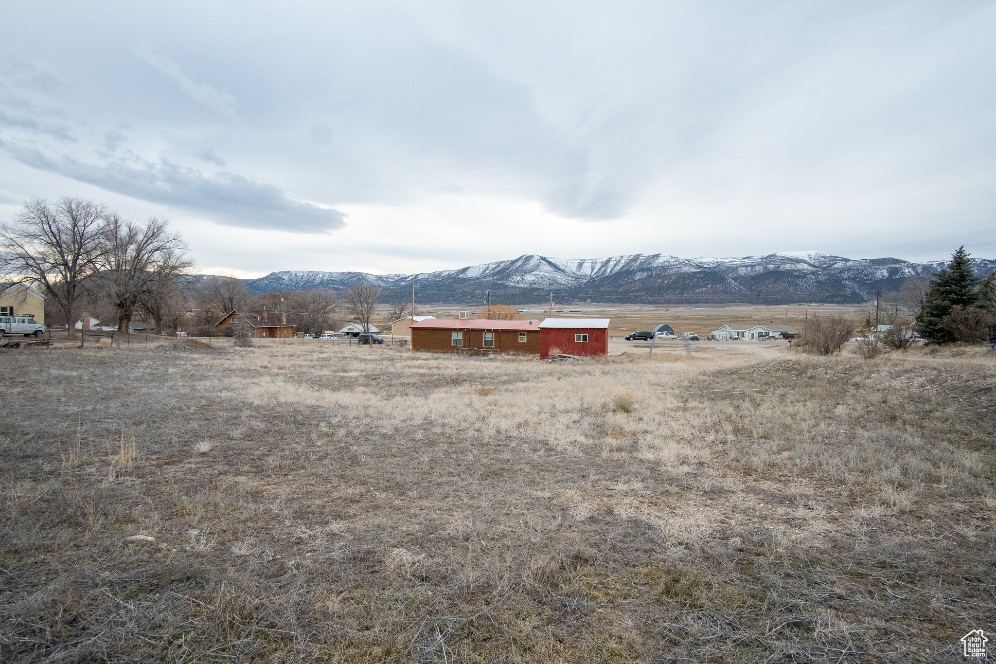 View of yard with a mountain view and a rural view