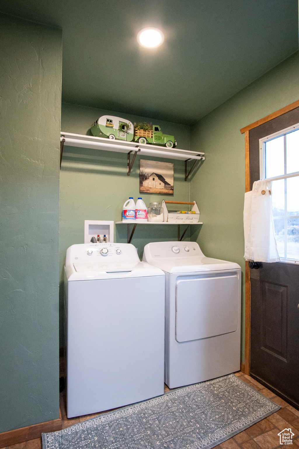 Clothes washing area with washing machine and dryer