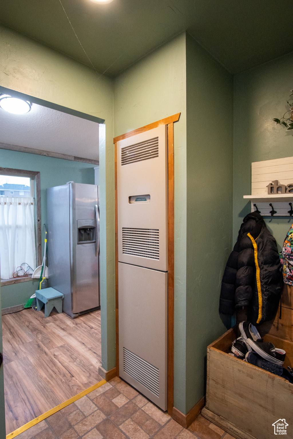 Hallway with wood-type flooring