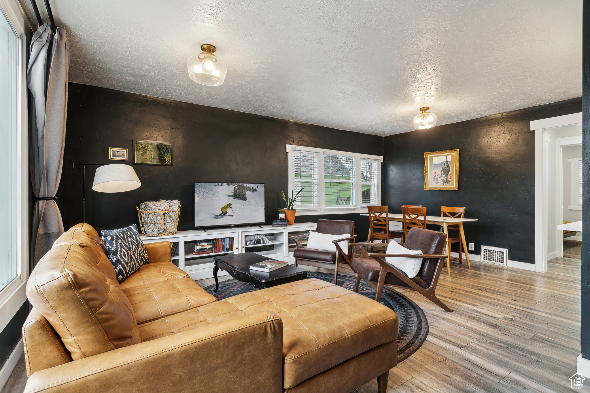 Living room with hardwood / wood-style floors