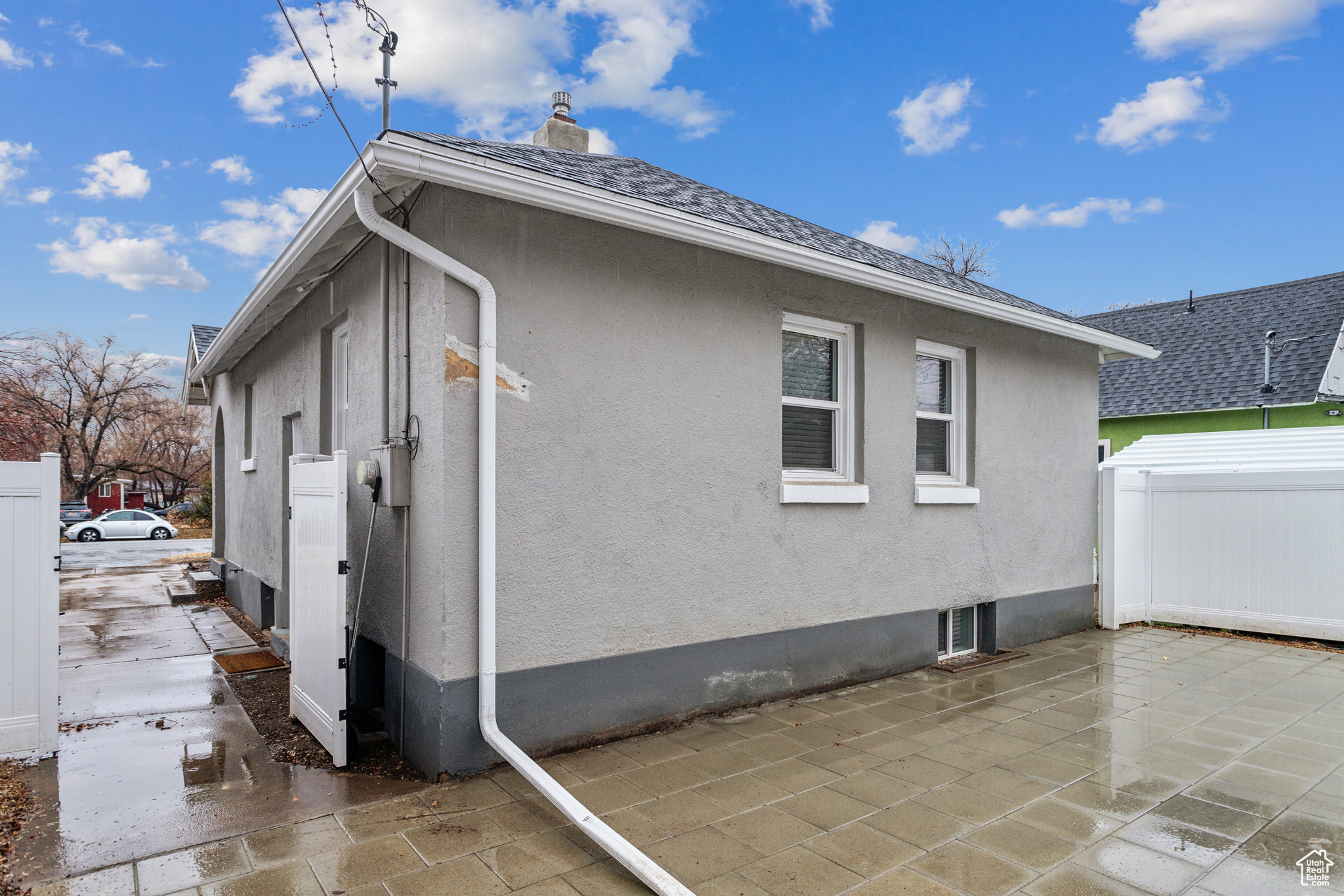 View of side of property with a patio