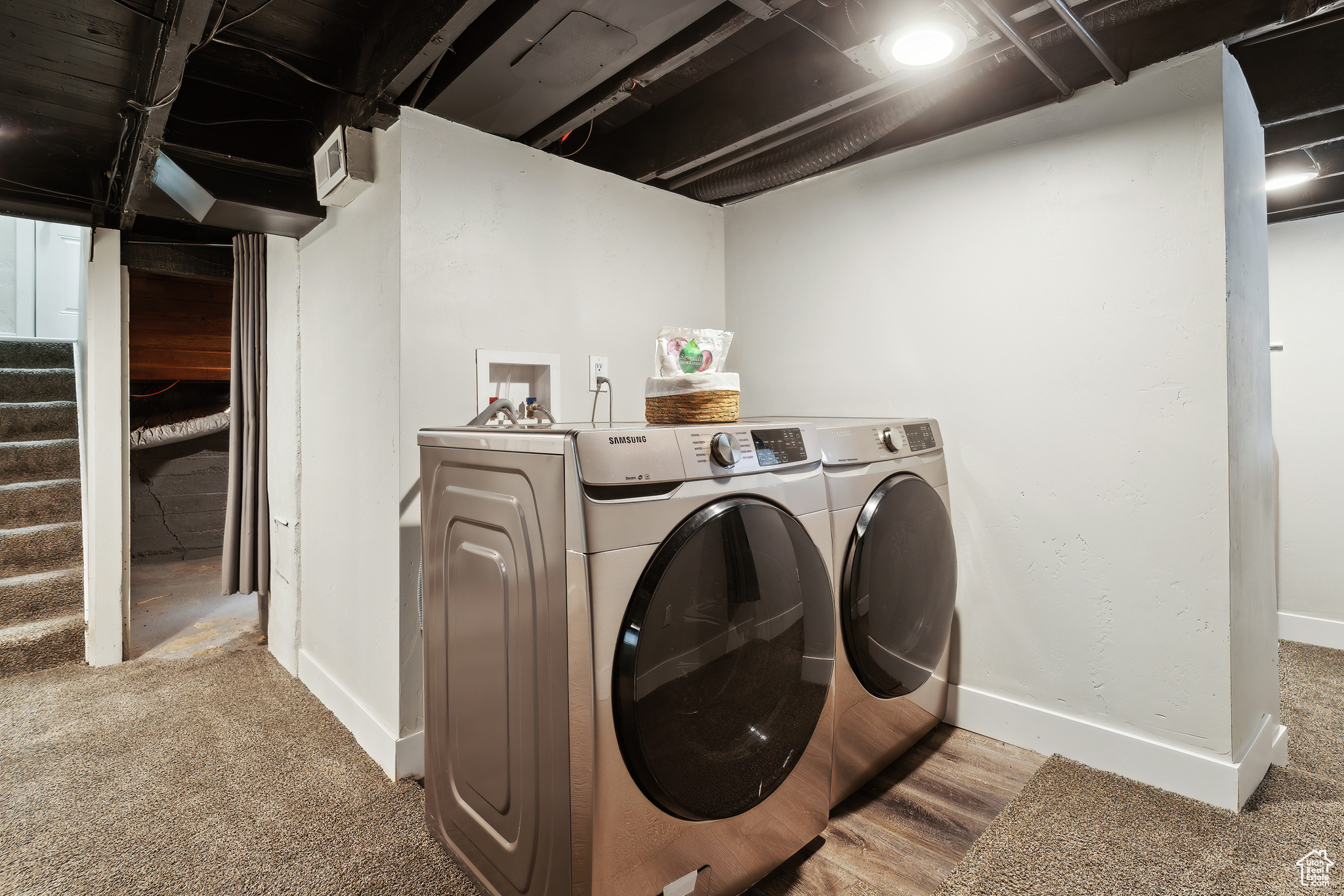 Laundry room with independent washer and dryer