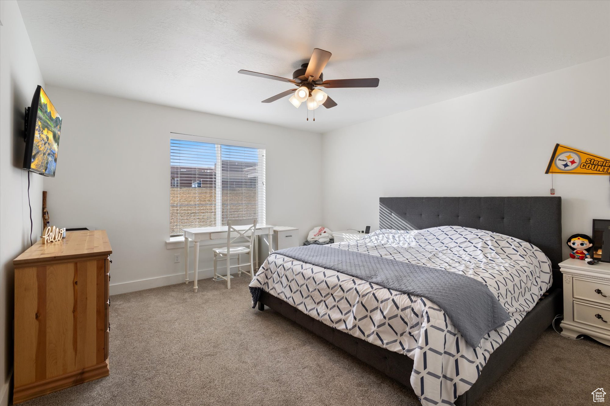 Bedroom with ceiling fan and carpet flooring