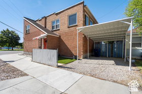 View of front facade with a carport