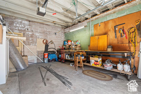Garage featuring a workshop area