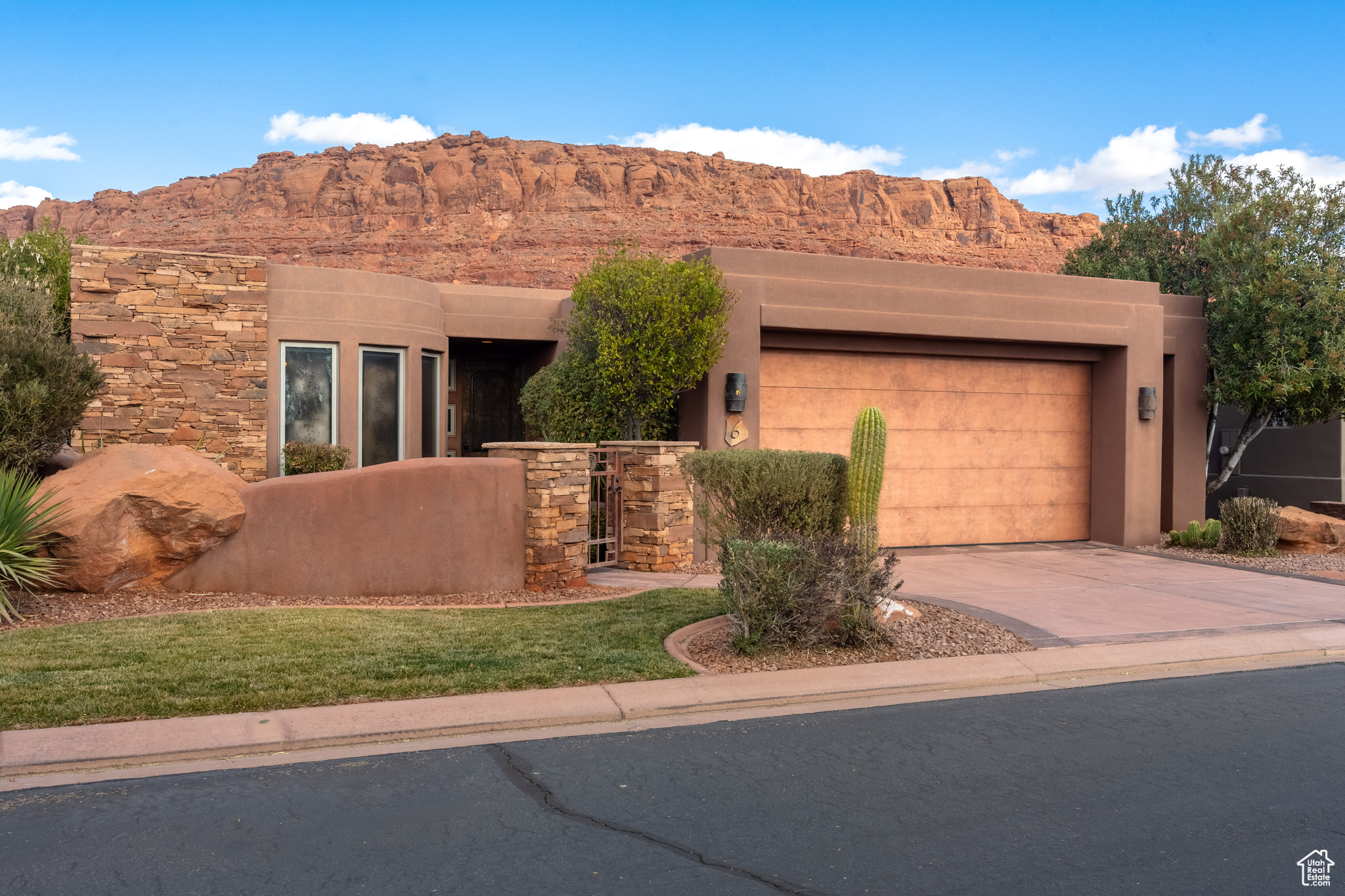 Pueblo-style house featuring a mountain view