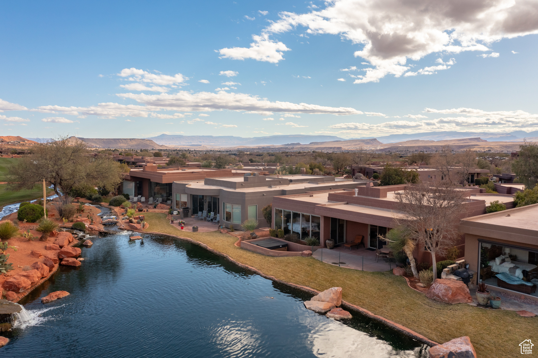 View of pool featuring a water and mountain view, a yard, and a patio area