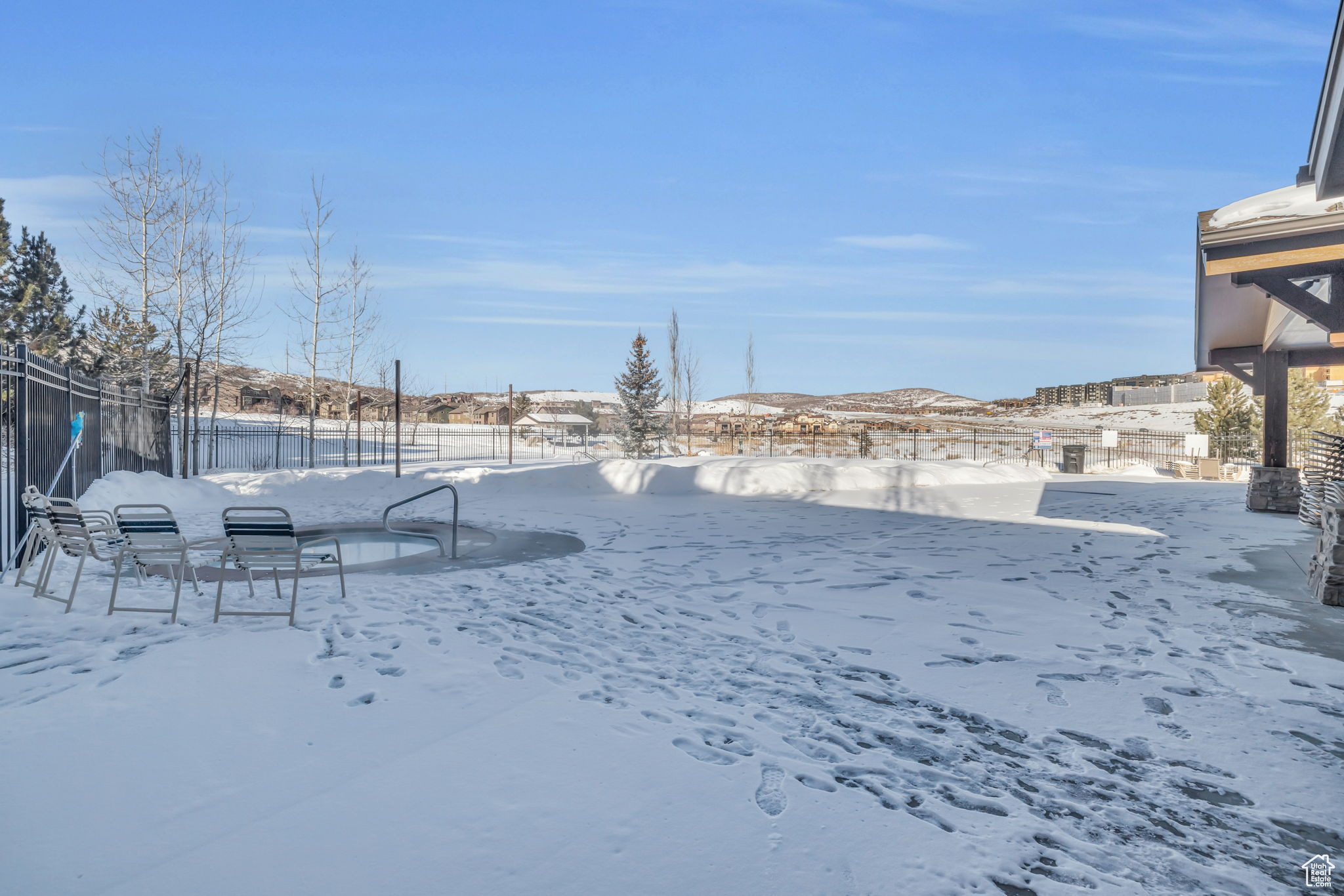 View of yard covered in snow