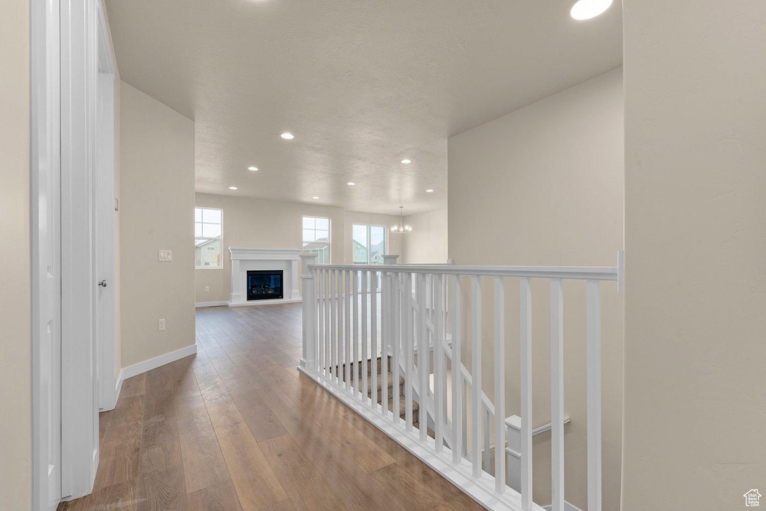 Hallway featuring wood-type flooring