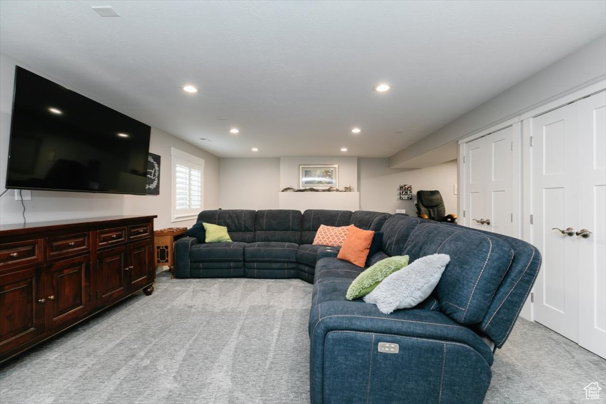 Living room with light colored carpet