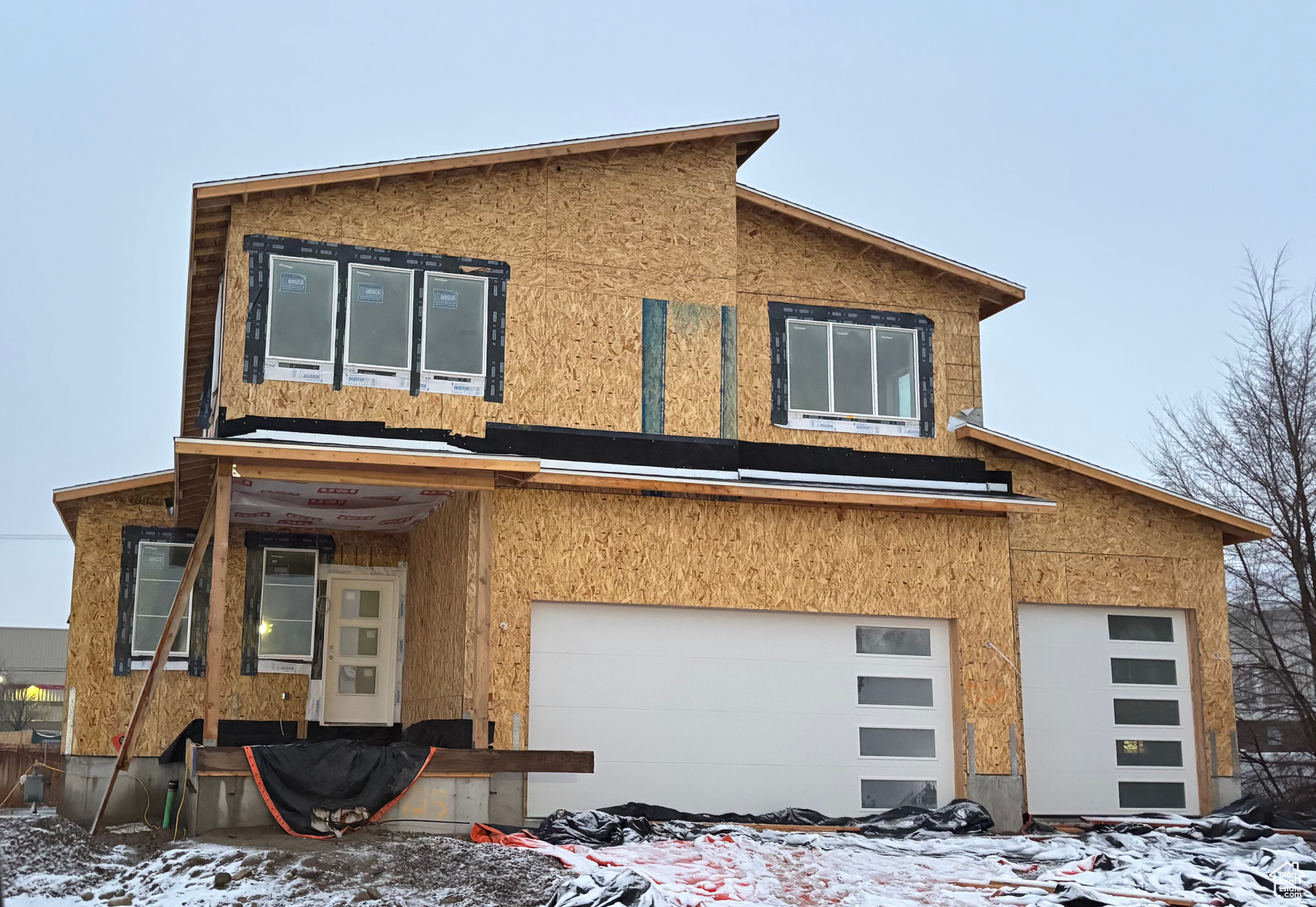 View of front of home with stucco siding