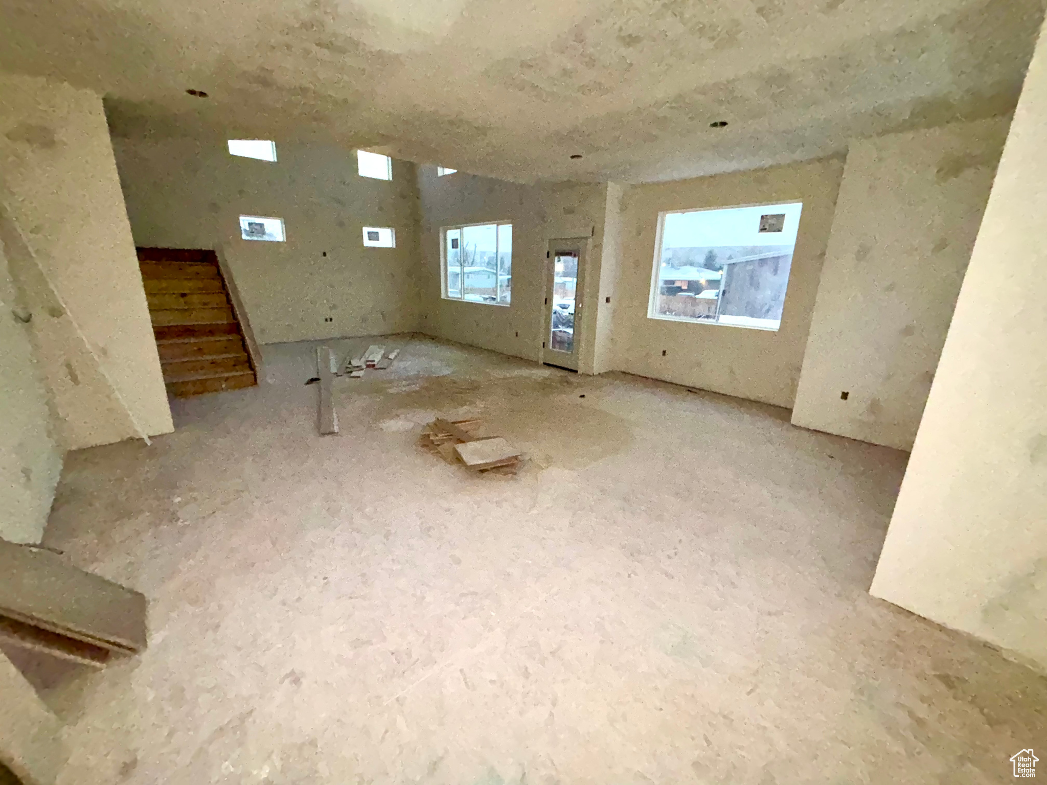 Empty room featuring stairs