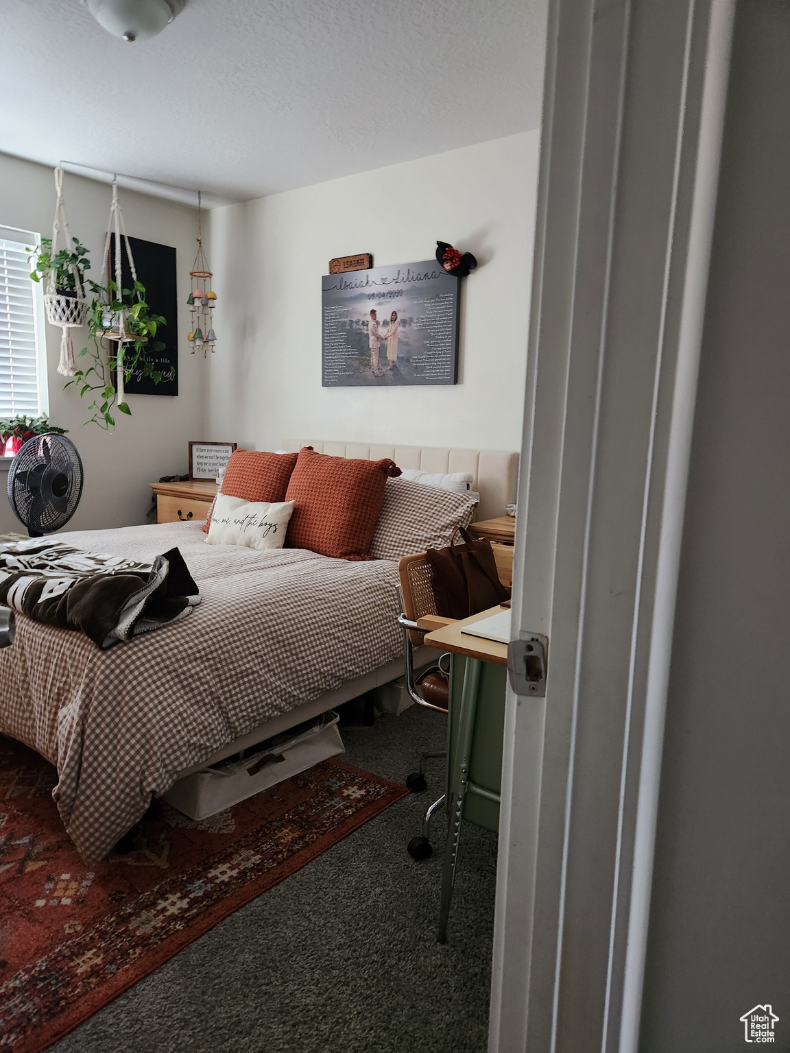 Bedroom featuring carpet flooring