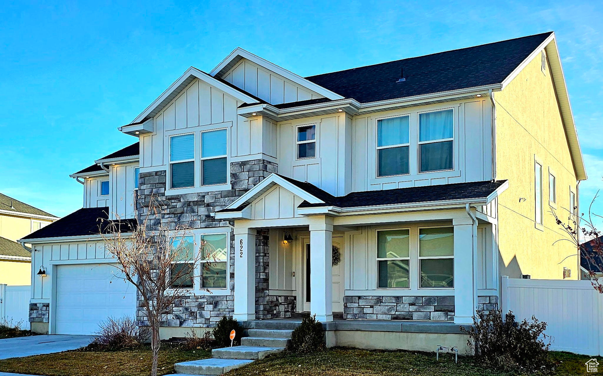 View of front of property with a garage