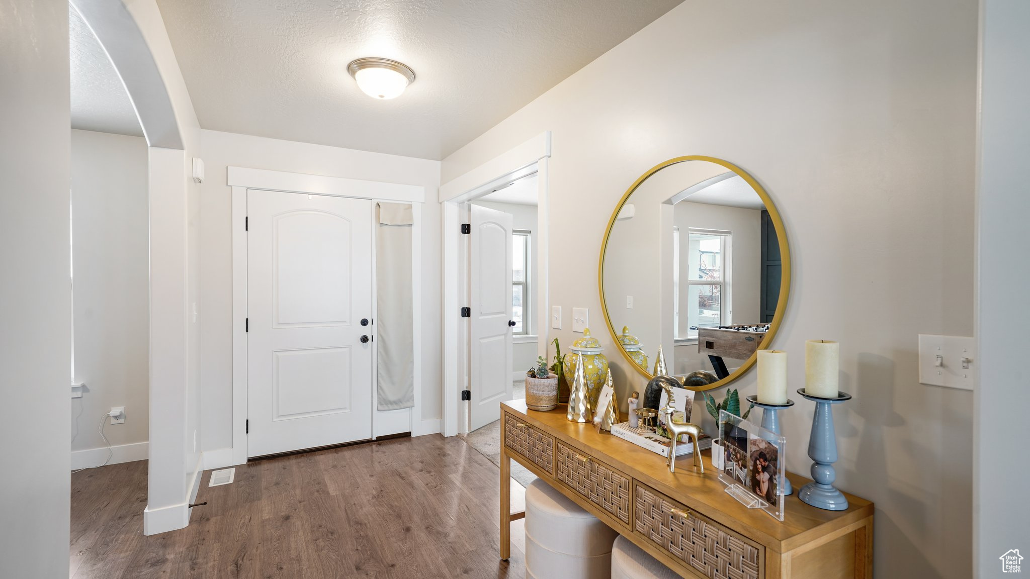 Foyer with hardwood / wood-style flooring