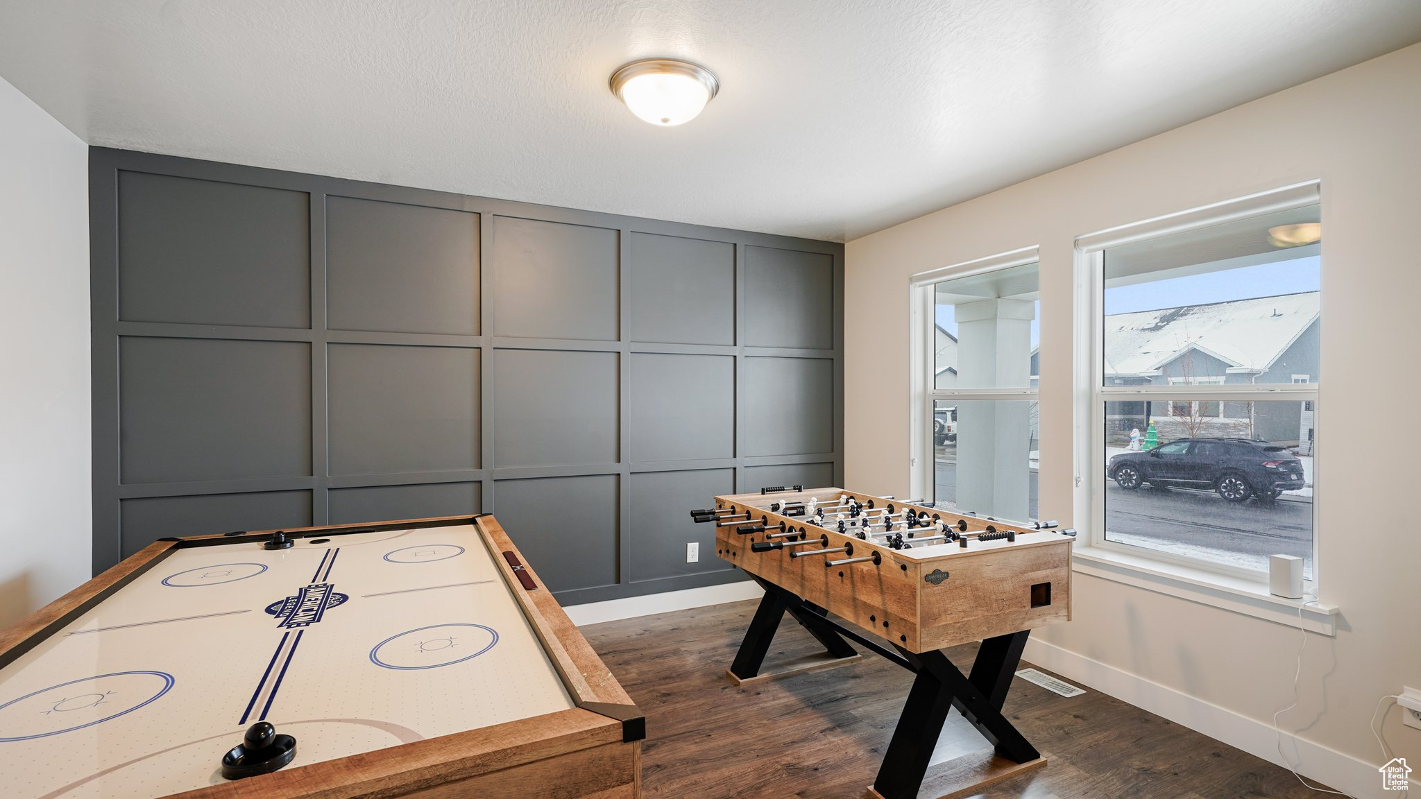 Office/Recreation room with dark hardwood / wood-style flooring