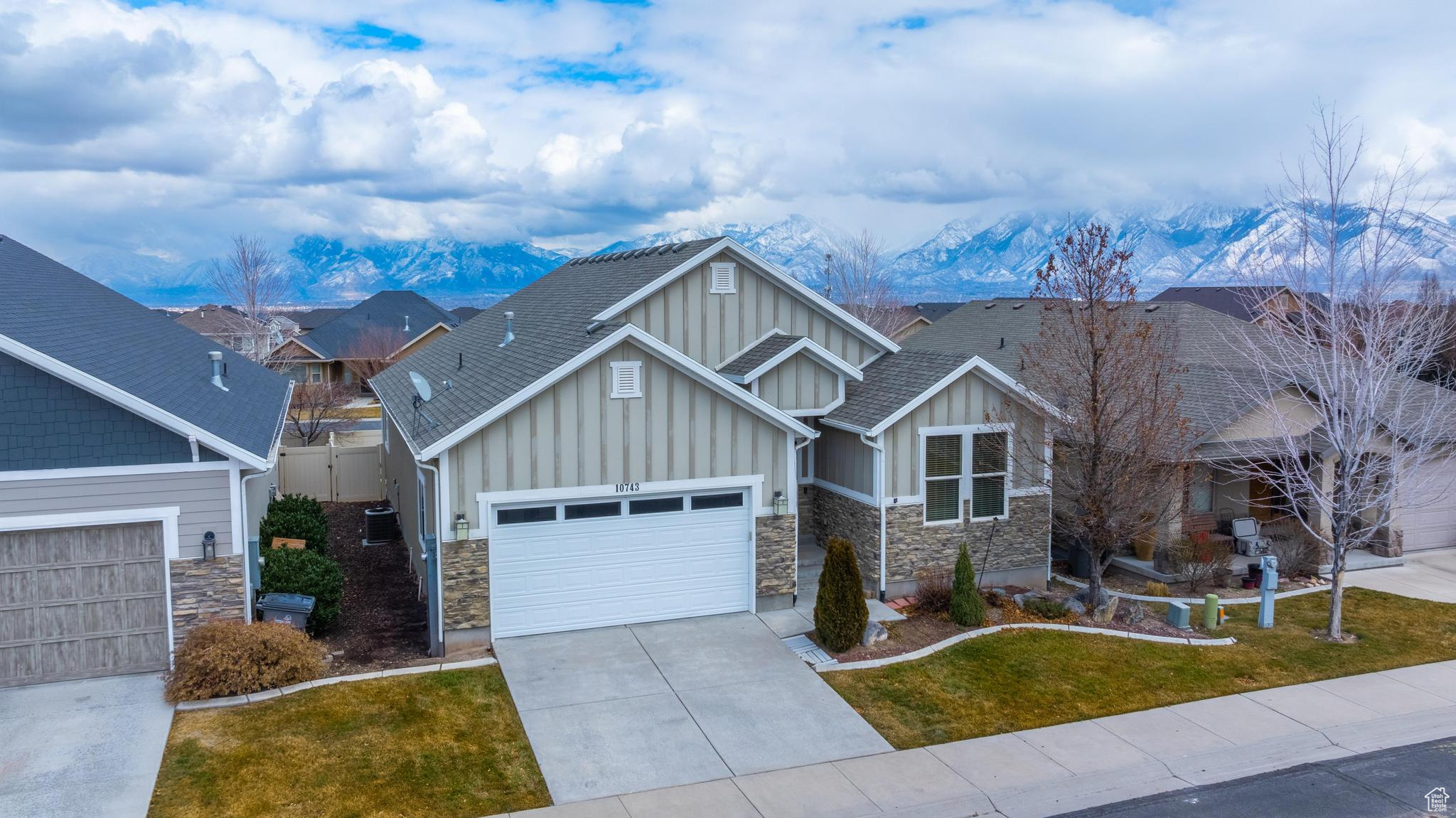 Craftsman-style house with HOA maintained front yard