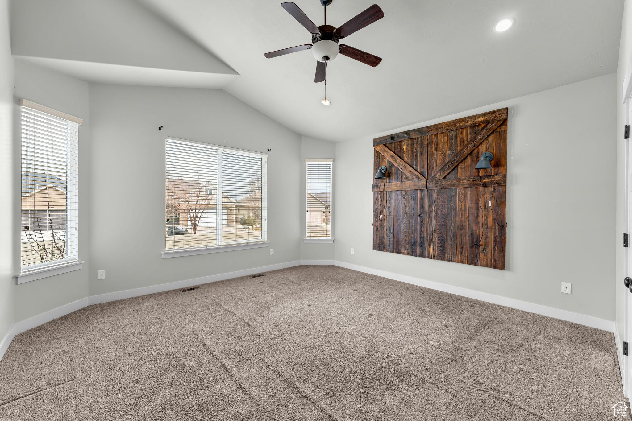 Tons of windows and ceiling fan