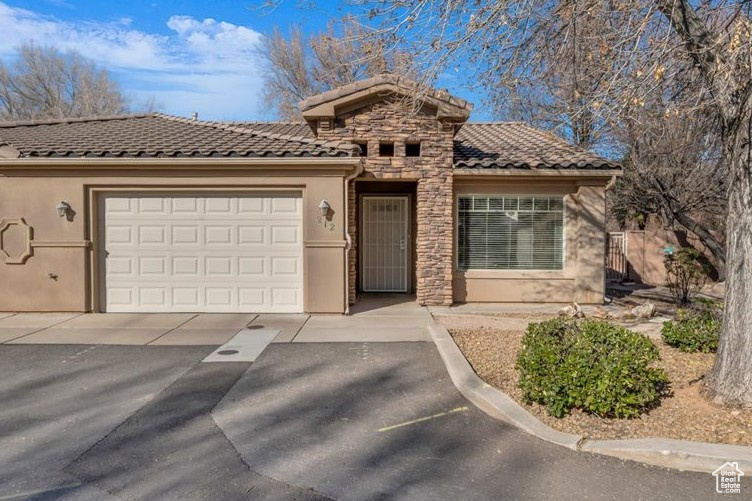View of front of home with a garage