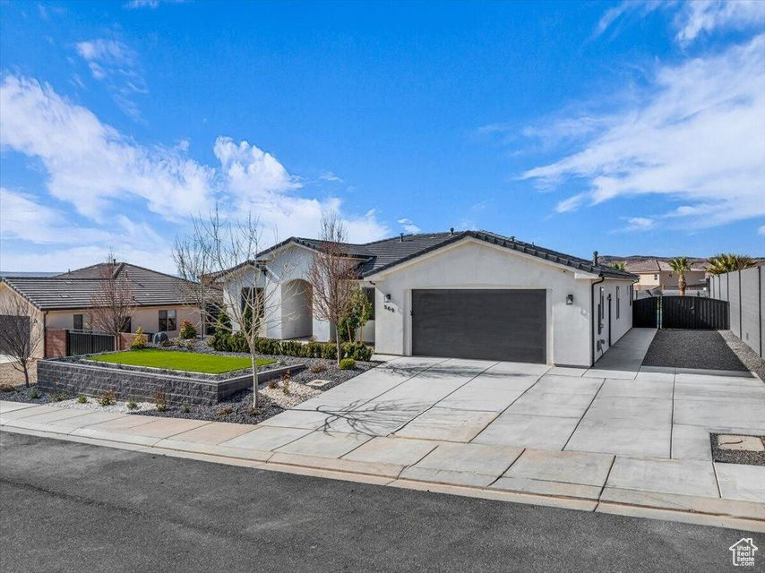 Single story home featuring a garage
