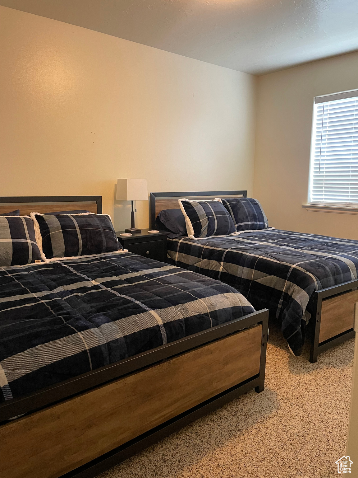 Bedroom featuring carpet flooring