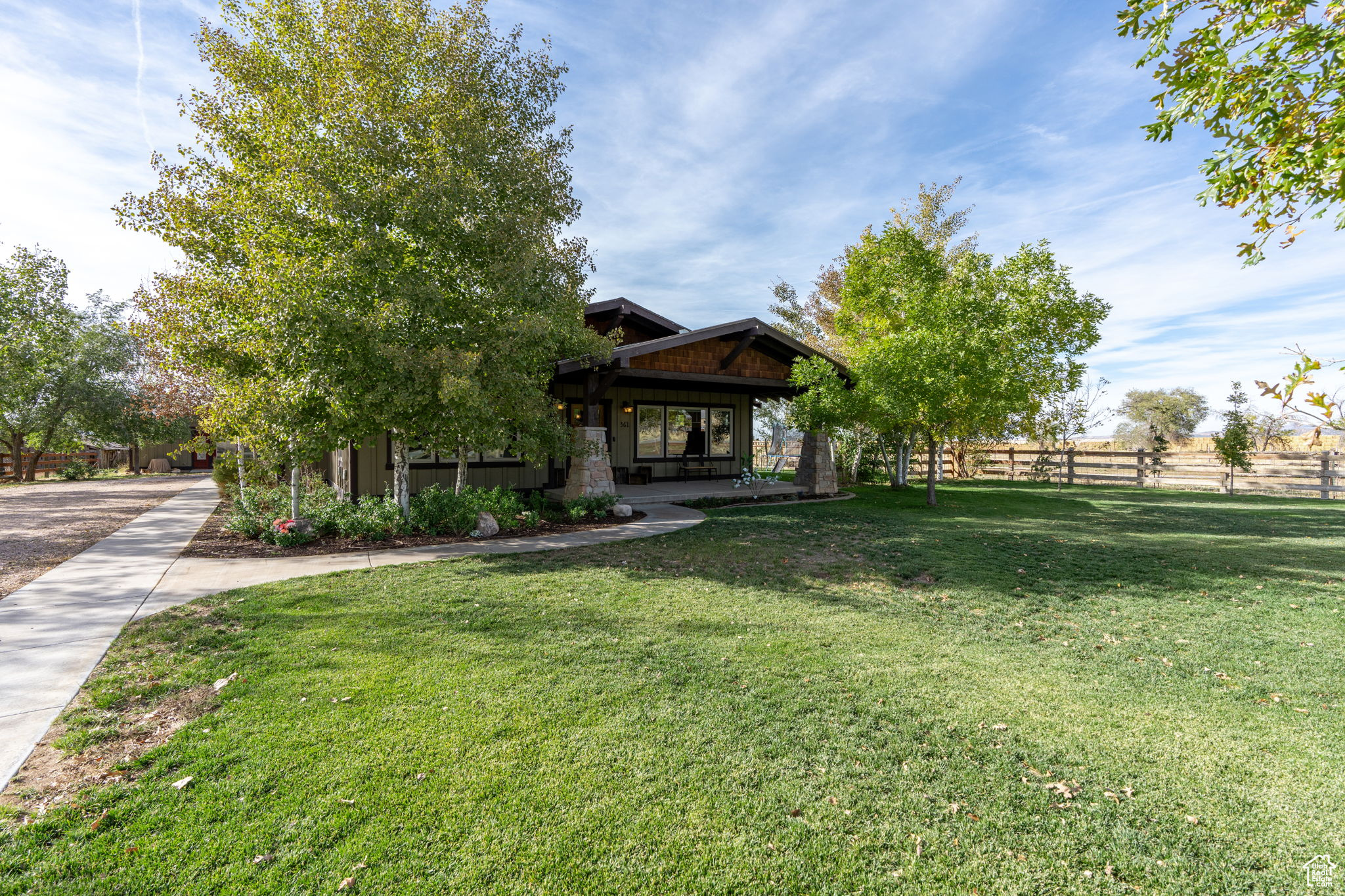 View of front of property with a front yard