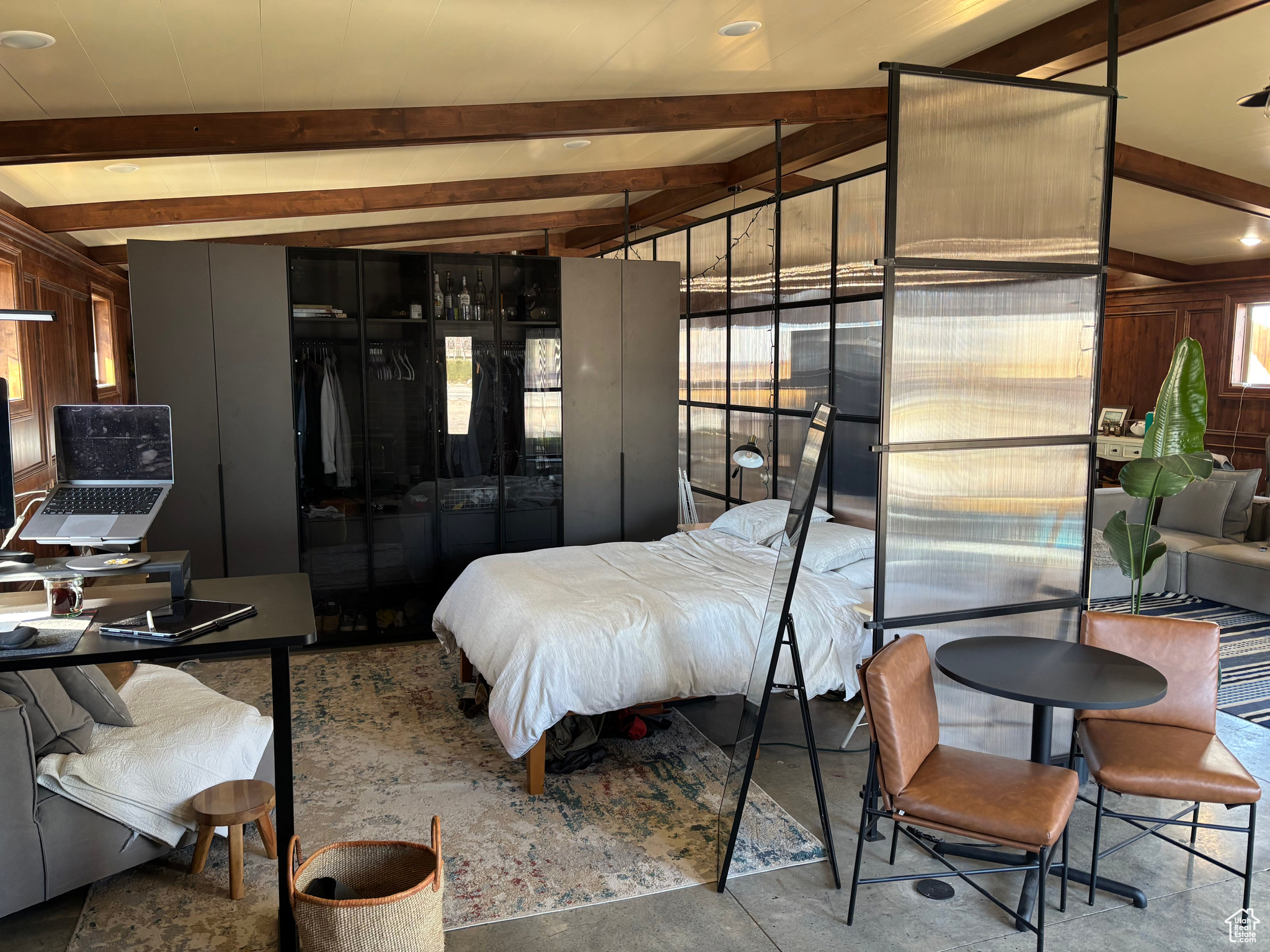 Bedroom featuring beam ceiling